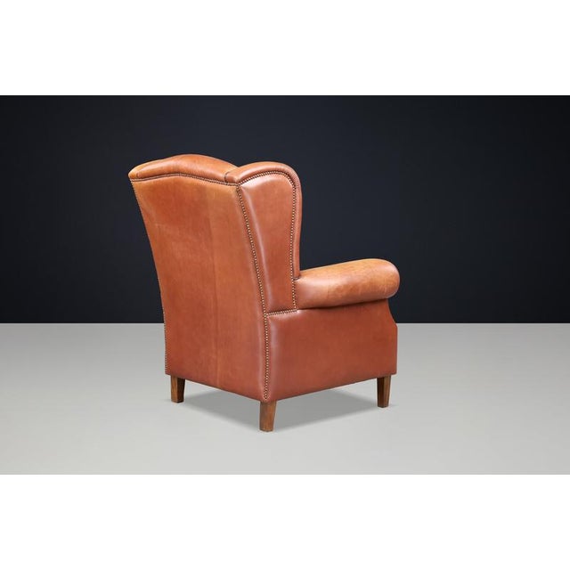 Patinated Cognac Leather Wingback Lounge Chair, Netherlands, 1960s For Sale - Image 6 of 13