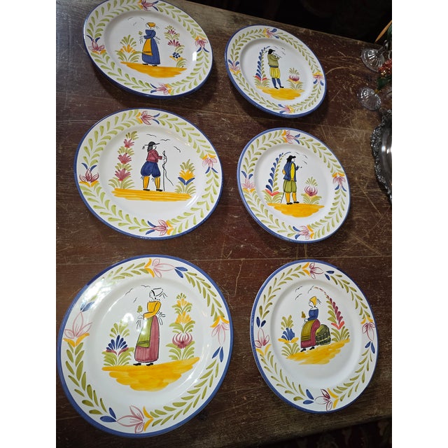 Pretty hand painted plates with special back made for putting wire so they can be hung on a wall.