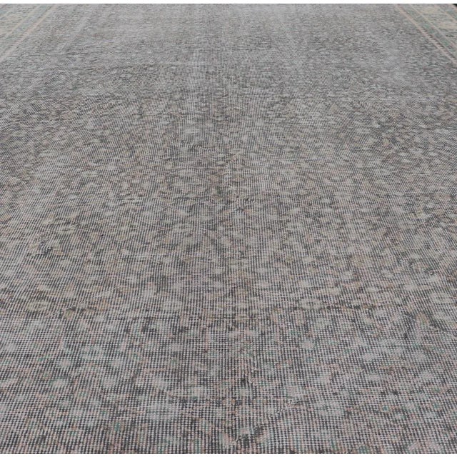 Turkish Mid 20th Century Vintage Hand-Knotted Distressed Turkish Rug in Wool With All-Over Floral Pattern For Sale - Image 3 of 13