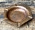 This vintage hexagonal ashtray is a compelling example of handcrafted metalwork, showcasing the enduring beauty of...