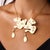 1970s Vintage Diamond 14k Yellow Gold Double Dragon Pendant Necklace For Sale - Image 5 of 6