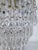 Vintage Hollywood Regency loral Embossed Brass Tiered Waterfall "Wedding Cake" Crystal Chandelier For Sale - Image 4 of 8