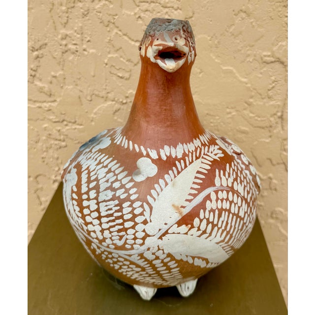 Mexican folk art ceramic ewer with goose form, with hand painted details 11” height 9” width 12” depth