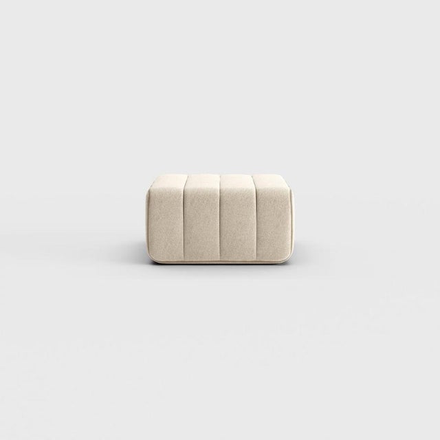 Pouf, stool, ottoman—or simply the building block for what is probably the world’s most versatile sofa system? The Curt...