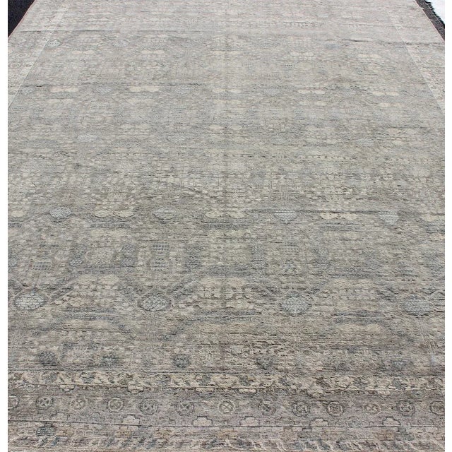 Taupe, gray, blue and neutral tones geometric Herati Tabriz design rug. Keivan Woven Arts / rug PMZ-85034856, country of...