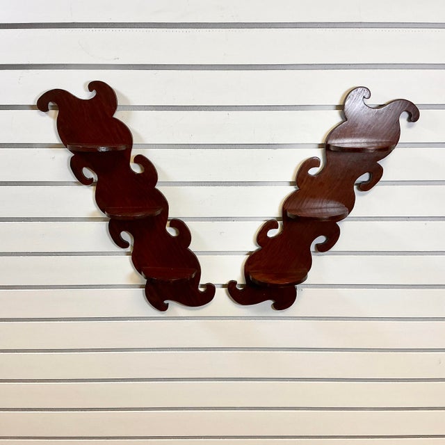 This pair of display wall-mounted shelves are from the 1940s. They are Folk Art pieces having been hand-crafted. They have...