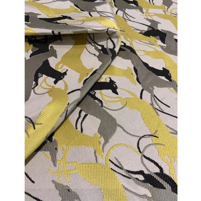 This gorgeous modern woven fabric has a gray and chartreuse greyhound pattern. The hand is soft and this fabric is...