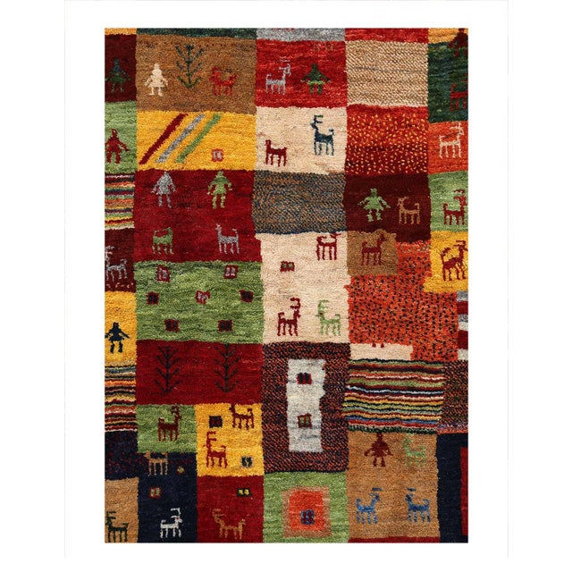 The word “Gabbeh” literally translates to “in the rough,” and it is an accurate description of this style of rug. Gabbeh...