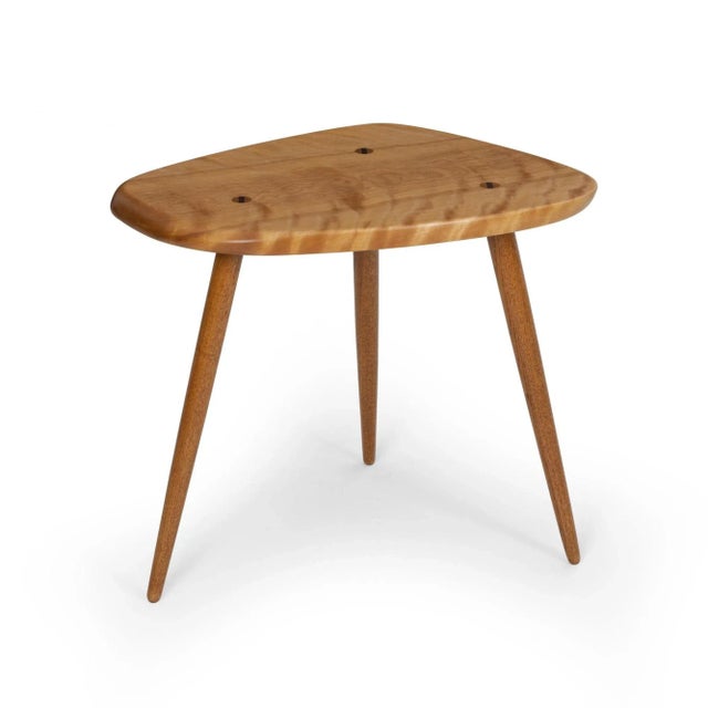 Arthur Espenet Carpenter Three-Legged Occasional Table in solid birch trapezoidal top with turned oak legs that pierce the...