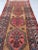 Name: RAW Nomadic Antique Camel Hair Runnr with Coral Pinks, Watermelon, Rust Size: ~ 3.2 x 9.5 Age: Antique, C. 1920-30’s...