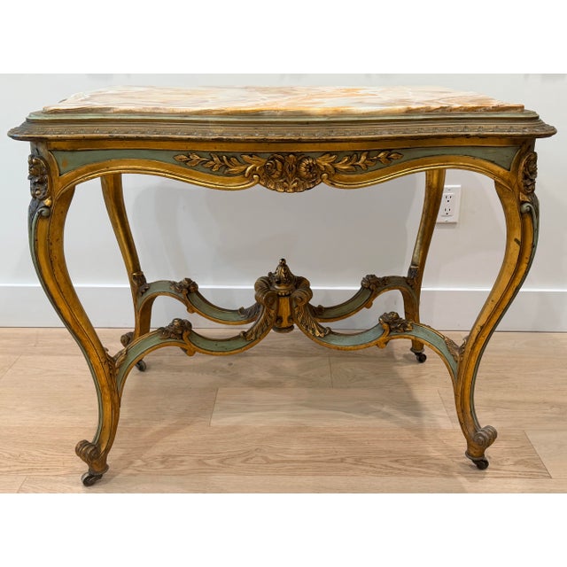 Louis XVI Style Table With Onyx Top, Carved and hand painted with green and gold paint with floral details. The onyx top...