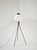 A stunning Stilnovo-style tripod floor lamp dating back to the 1950s and 1960s. This piece represents a classic of Italian...