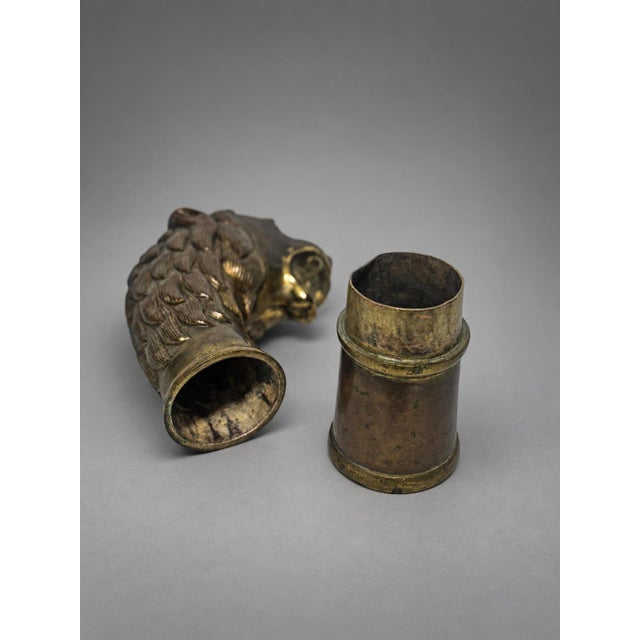 A European lion-head covered container, probably dating to the late nineteenth or early twentieth century, fashioned in...