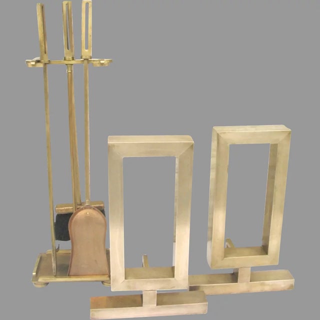 Pair of andirons and matching tools by Donald Deskey. Donald Deskey was the Interior Designer of the Radio Music Hall....