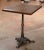 This exquisite, antique gueridon table was crafted in Paris, France, circa 1870. The intricate iron base sits on three paw...