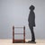 Mid-19th century walnut étagère featuring an elegant three-shelf structure. Each shelf is supported by four finely turned...