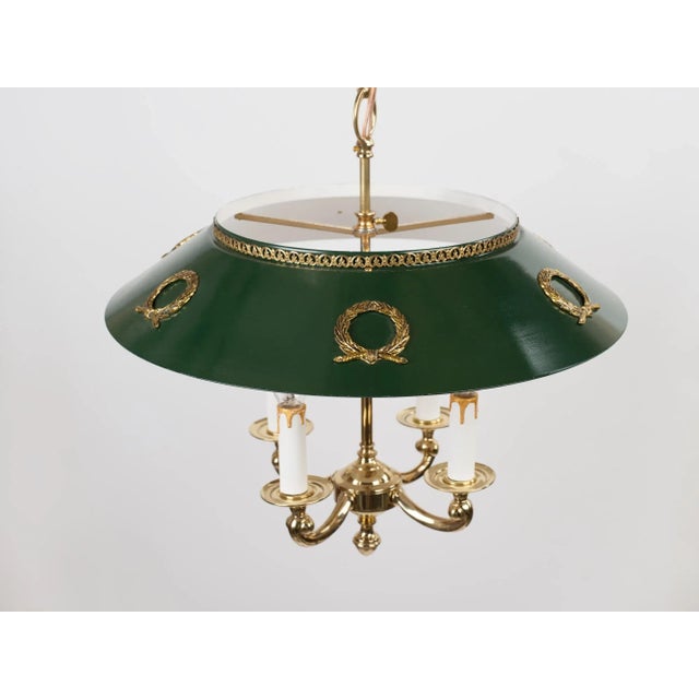 Brass Bouillotte chandelier in French Empire style for 4 bulbs with adjustable metal lampshade painted green and bronze...