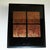 Copper Colored Metal Repousse style in a Shadow box.