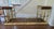 Brass Fireplace Club Fender with brown Leather Upholstered Seats featuring brass nailhead trim and and decorative...