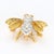 This small bee shaped pin is covered by sixteen diamonds on its back and two rubies for the eyes. Stone Info: 2x Rubies...