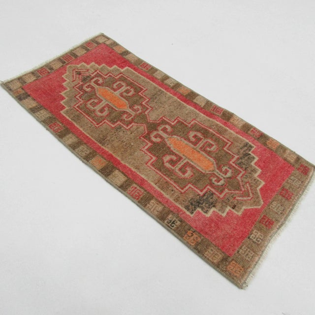 Vintage handknotted decorative mini rug from Konya region of Turkey. Approximately 50-60 years old. In very good condition.