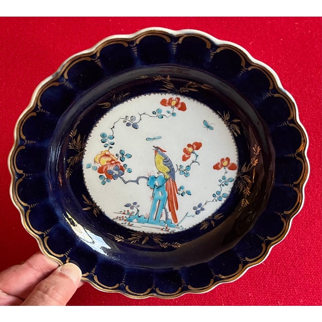 Antique 18th century first period Worcester porcelain exotic bird plate in the Kakiemon taste, circa 1780. Decorated with...