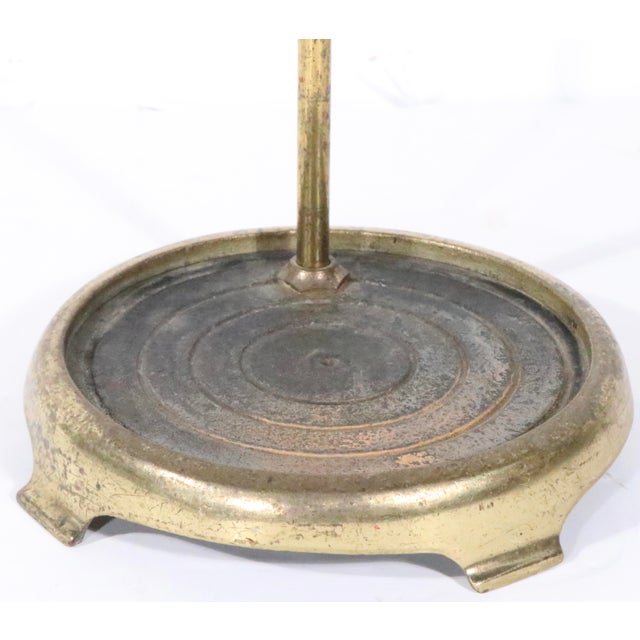 Colonial Revival style brass fireplace tool set consisting of a poker, shovel, tongs, brush and stand; The set is in very...