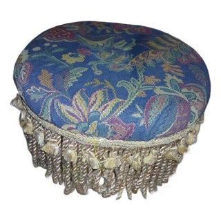 Vintage Blue Floral Paisley Ottoman Foot Stool With Tapestry Upholstery and Gold Tassel Fringe. For Sale