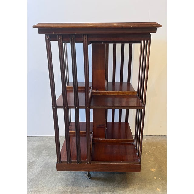 Beautiful Antique Two Tiered Mahogany Bookcase w/Inlay. Square frame, swivels on rollers. Really nice piece. 18.5" x 18.5"...
