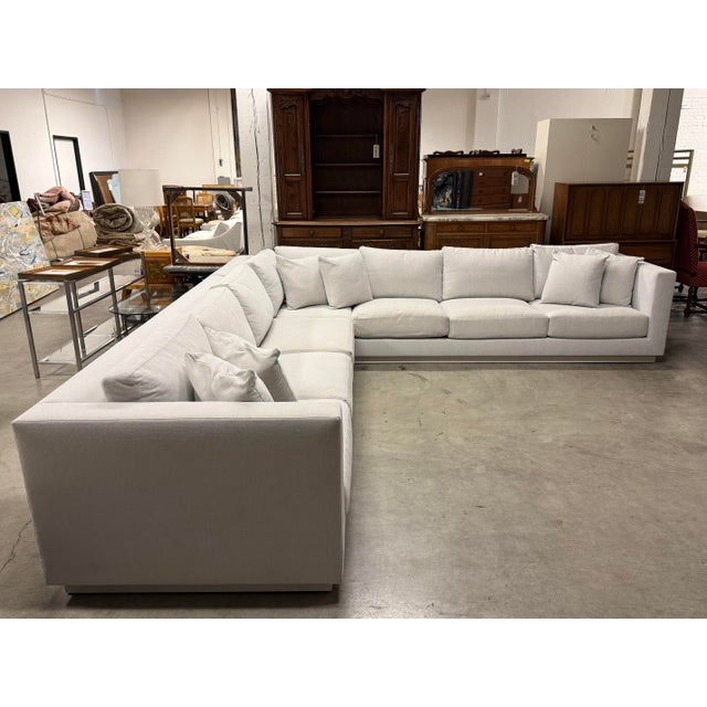 Design Plus Gallery presents a Andrew Woodside Carter Custom Made Two Piece Sectional. Features a sturdy two-piece frame...