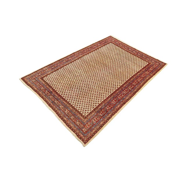 Classic Rug from the 1960s from the city of Sarouk. Wonderful through-patterned pile in cream and accents in shades of...