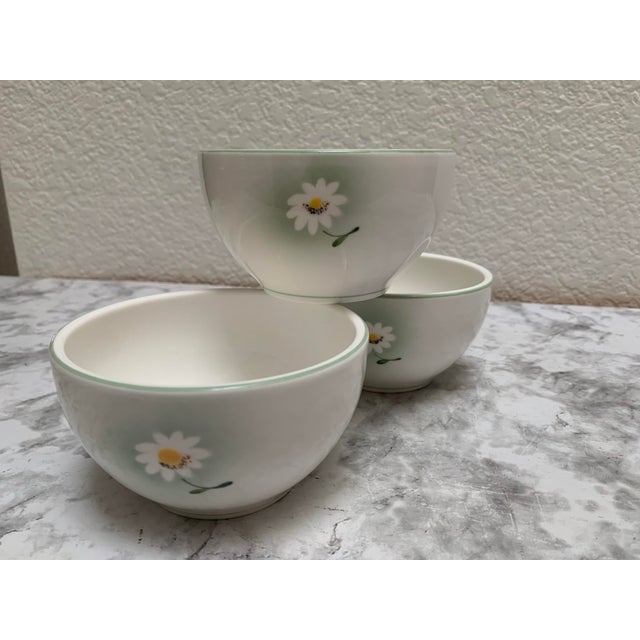 Whimsical set of three vintage small bowls with hand painted daisies. Sweet side dish or ice cream bowls.