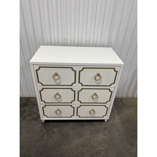 Offered is a vintage white and gold nightstand chest in the iconic style and manner of Dorothy Draper's Espana model....