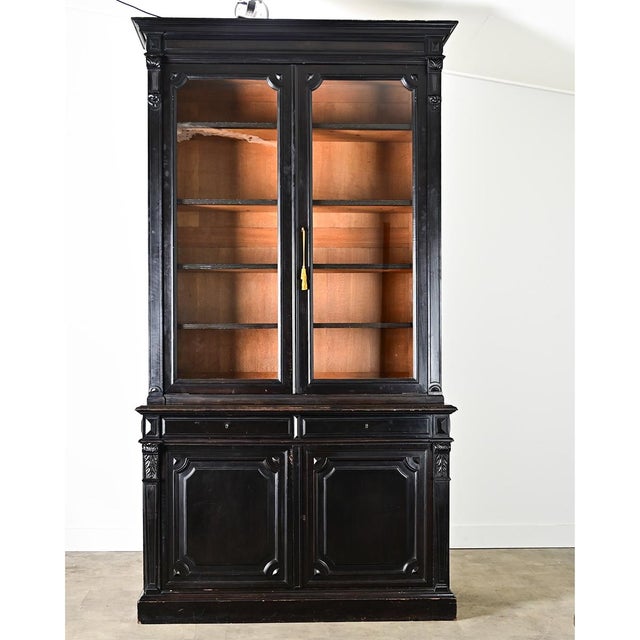 This French bibliotheque from the 19th century makes a dramatic statement for any interior by its height alone, and the...