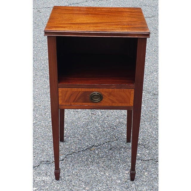 A Georgian Style Mahogany two-Tier Single Drawer Bed Side Table. Measures 15" in width, 13" in depth and stands 27.5" in...