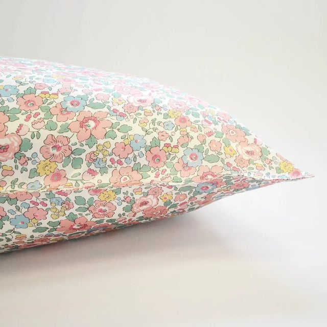 Part of our premium 'Treasured Collection' our stunning Liberty print pillowcases are handmade with luxurious Belgravia...
