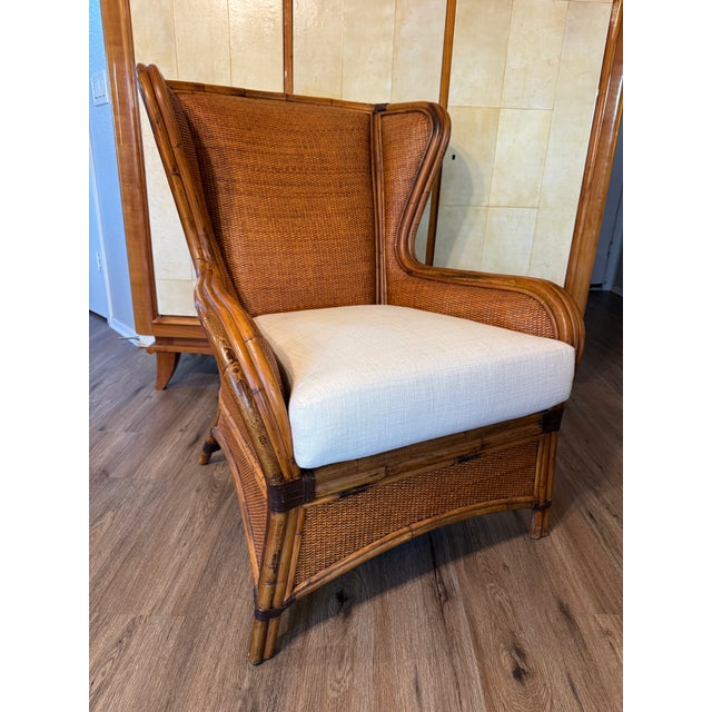 Sculptural high-end rattan lounge chair attributed after McGuire Furniture Co., produced in the Philippines circa the late...