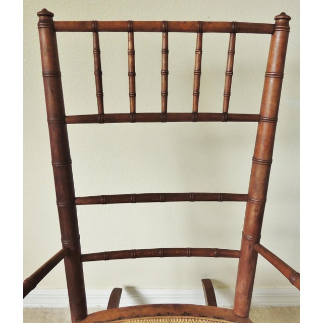 American Antique Early 20th Century Rj Horner Faux Bamboo Wood Wicker Seat Child's Rocking Chair For Sale - Image 3 of 11