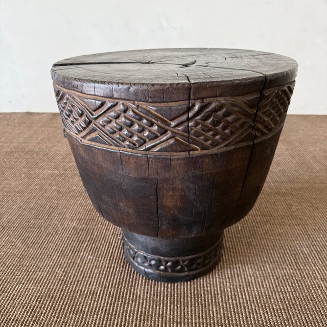 Size: 17"D x 17.5"H Wood Species: Walnut Finish: Walnut Crafted from solid walnut wood with a walnut finish, this...