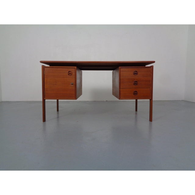 Danish desk by Gasvig Mobler from the 1960s. Three drawers on the left. One large, very deep compartment on the right. I...
