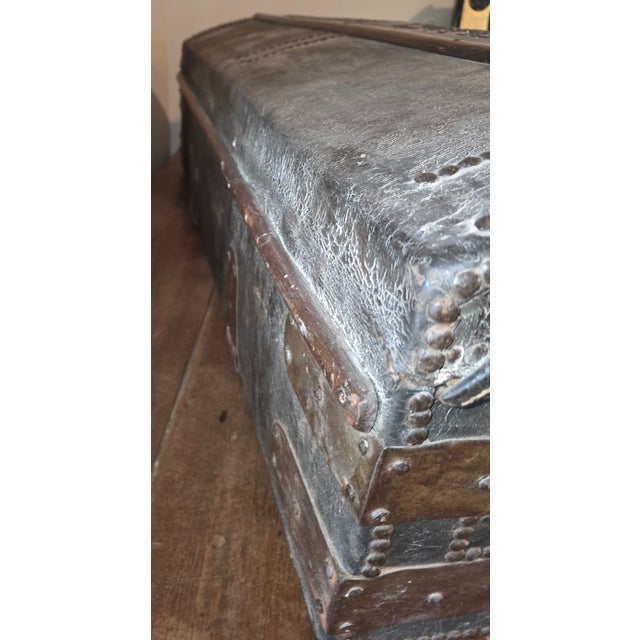 Circa 1800 leather and wood clad travel trunk ...dome top and fabric lined interior with optional later made wood legs.