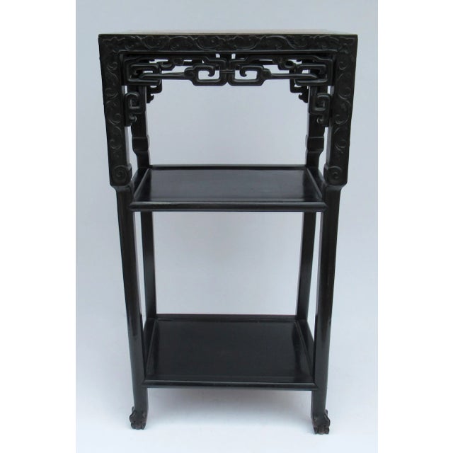Vintage Late 19th. Century, Chinese Hardwood hand-carved, with hoofed feet, is this 3-tiered, rectangular-shaped, side...