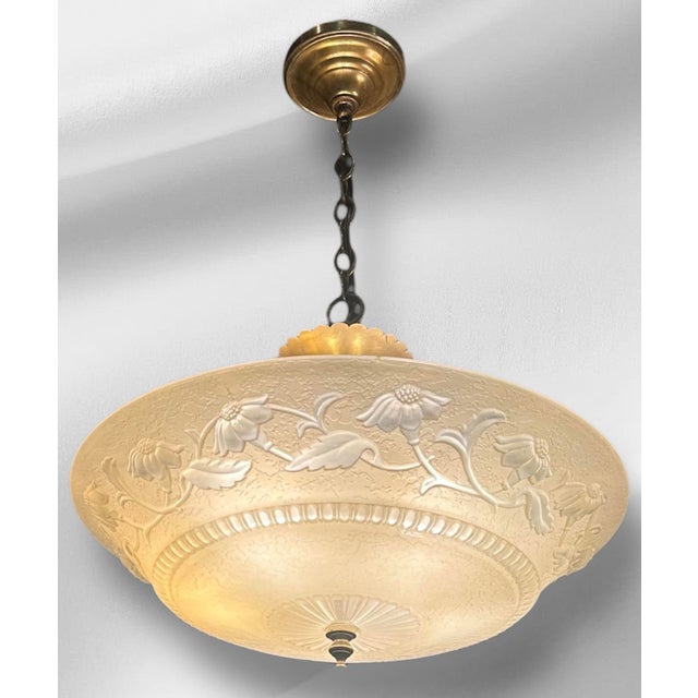 This set of delightful mid-century modern chandeliers are a stunning set to behold! From the original glossy patina of the...