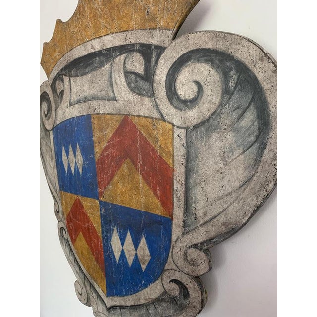 Decorate a games room or a study with this colorful painted curved plaque. Crafted in southern Italy, circa 1950, the...