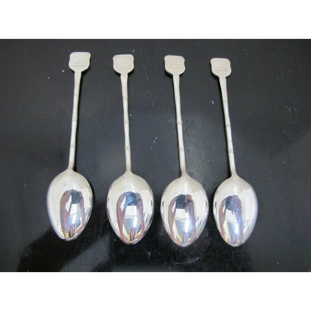 Sweet vintage sterling silver and enamel souvenir demitasse spoon set. Each with a different Hong Kong design at handle....