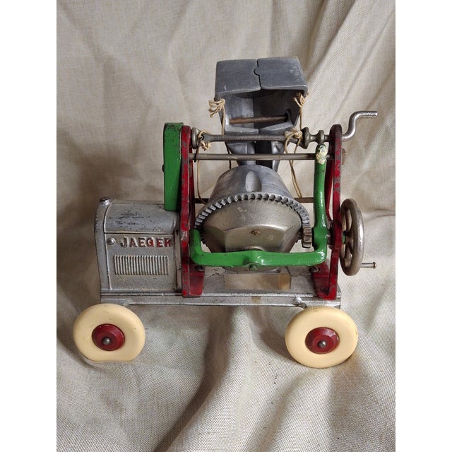 This is an exceptional example of the Jaeger Concrete Mixer produced by Kenton Toys of Kenton, Ohio. This specific model...