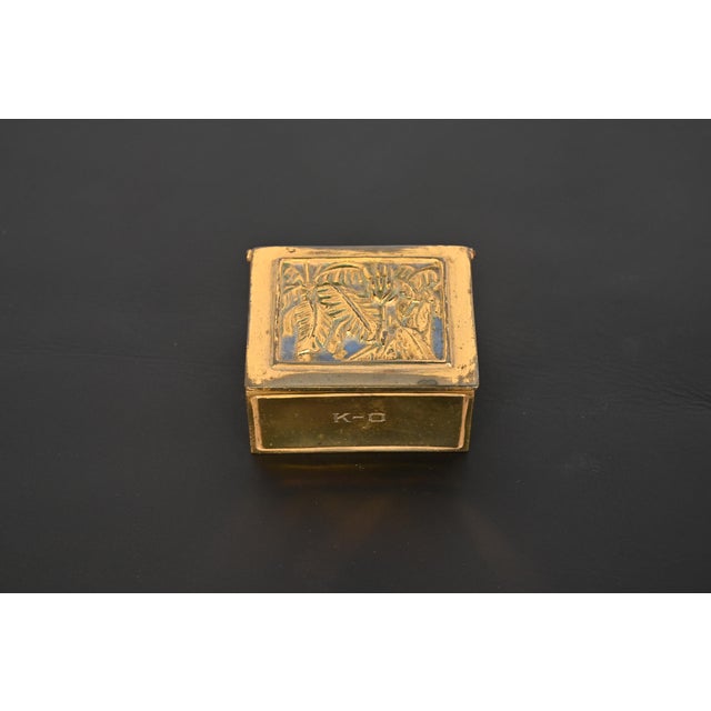 A stunning antique gilt bronze stamp box in the Bookmark design By Tiffany Studios (signed to the underside) New York,...