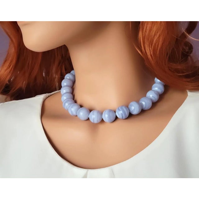 The length of the necklace is 17.5 inches (44.5 cm). The size of the smooth round beads is 16 mm. Blue Agate and Blue Lace...