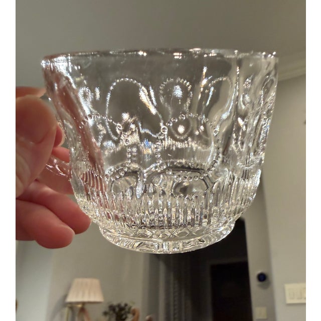 Bring timeless elegance to your entertaining with this vintage Tiffin-Franciscan Bullseye pressed glass punch bowl set....
