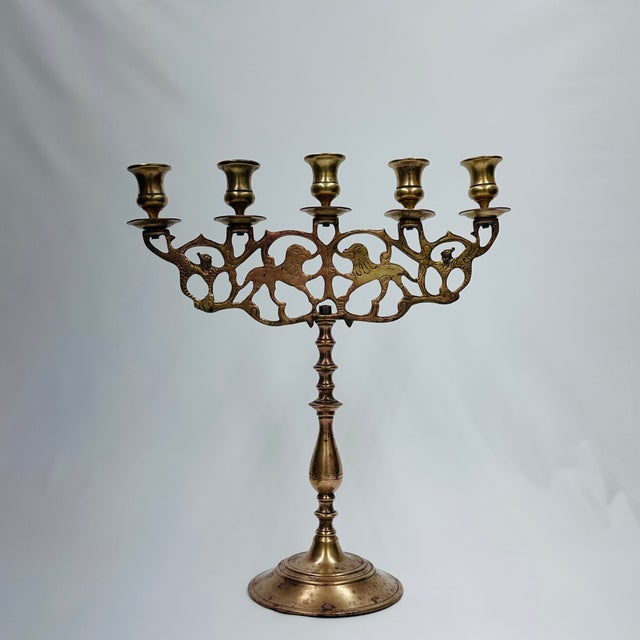 Brass Shabbat Five-Branch LIONS OF JUDAH CANDELABRUM, 20TH Century 17 x 15 1/2 in. (43.18 x 39.37 cm.) A magnificent...